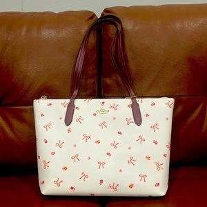 Coach tote bag with bows and flowers